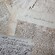 Worn pieces of parchment featuring cursive writing in ink